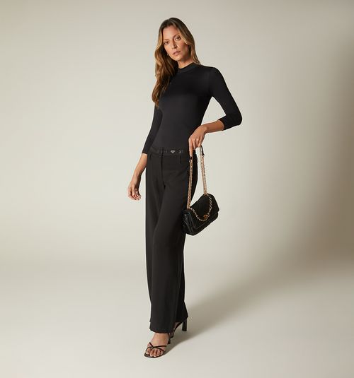 Low-rise pants with waistband and elastic