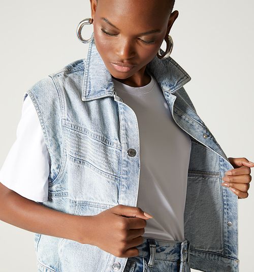 DENIM VEST WITH CUTS AND STITCHES