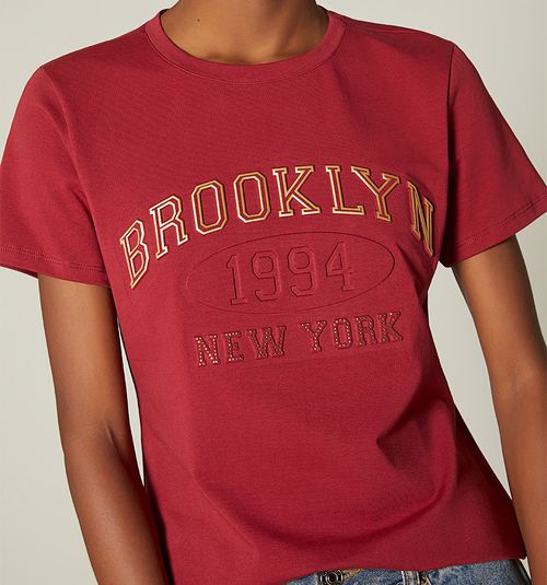 T-SHIRT WITH ANIMAL PRINT TEXT