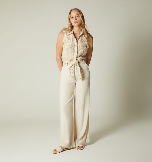 Jumpsuit with sleeveless blouse and belt