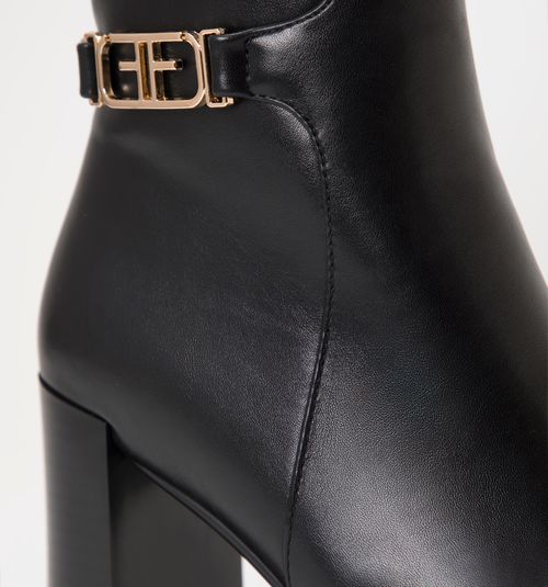 MID-CALF BOOT WITH PLATFORM AND HARDWARE